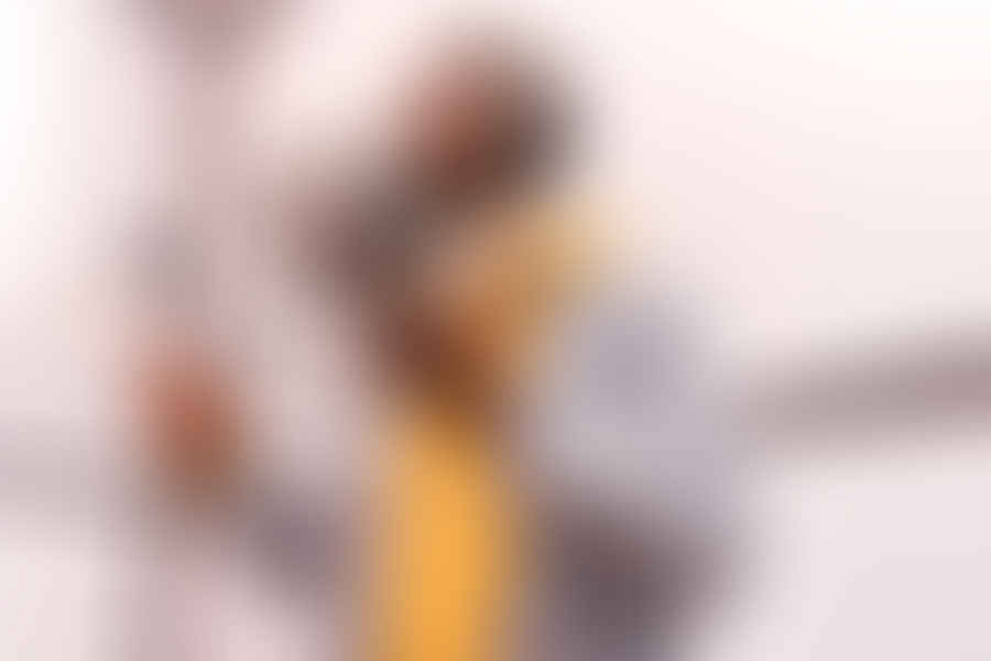 Man using iPhone to record video with music